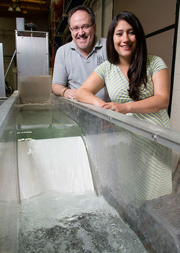 University of Illinois researchers Tatiana Garcia, a graduate student and civil and environmental engineering professor Marcelo Garcia developed a tributary assessment tool to predict how Asian carp eggs will disperse after spawning that will help resource managers develop strategies for preventing the spread of the invasive species if they were to move into the Great Lakes. Photo by L. Brian Stauffer, University of Illinois News Bureau.